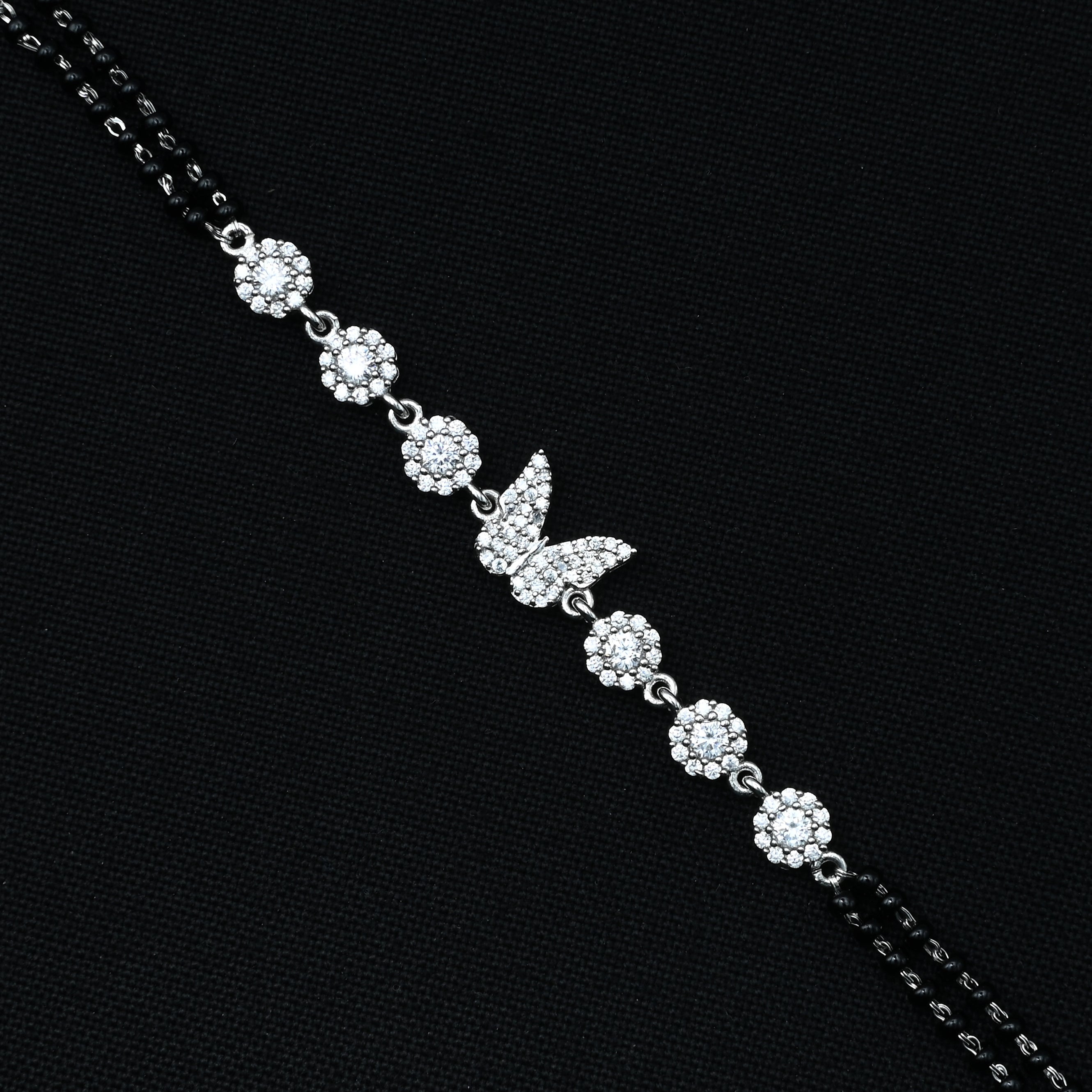 Silver Bracelet with Butterfly Bud and White Stones – Mangalsutra Design