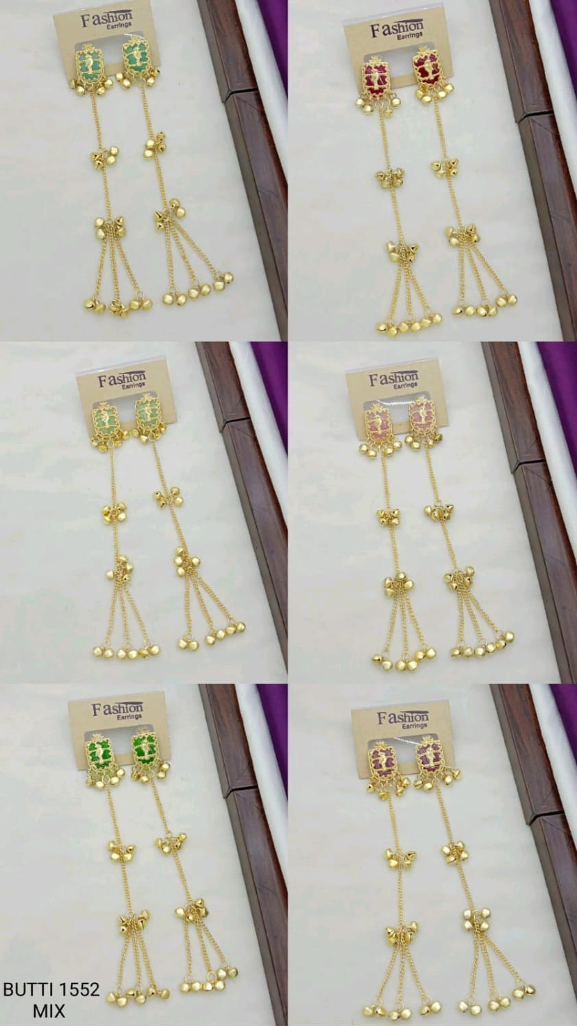gold-plated Kashmiri drop earrings feature green stones and delicate ghungroo bell drops