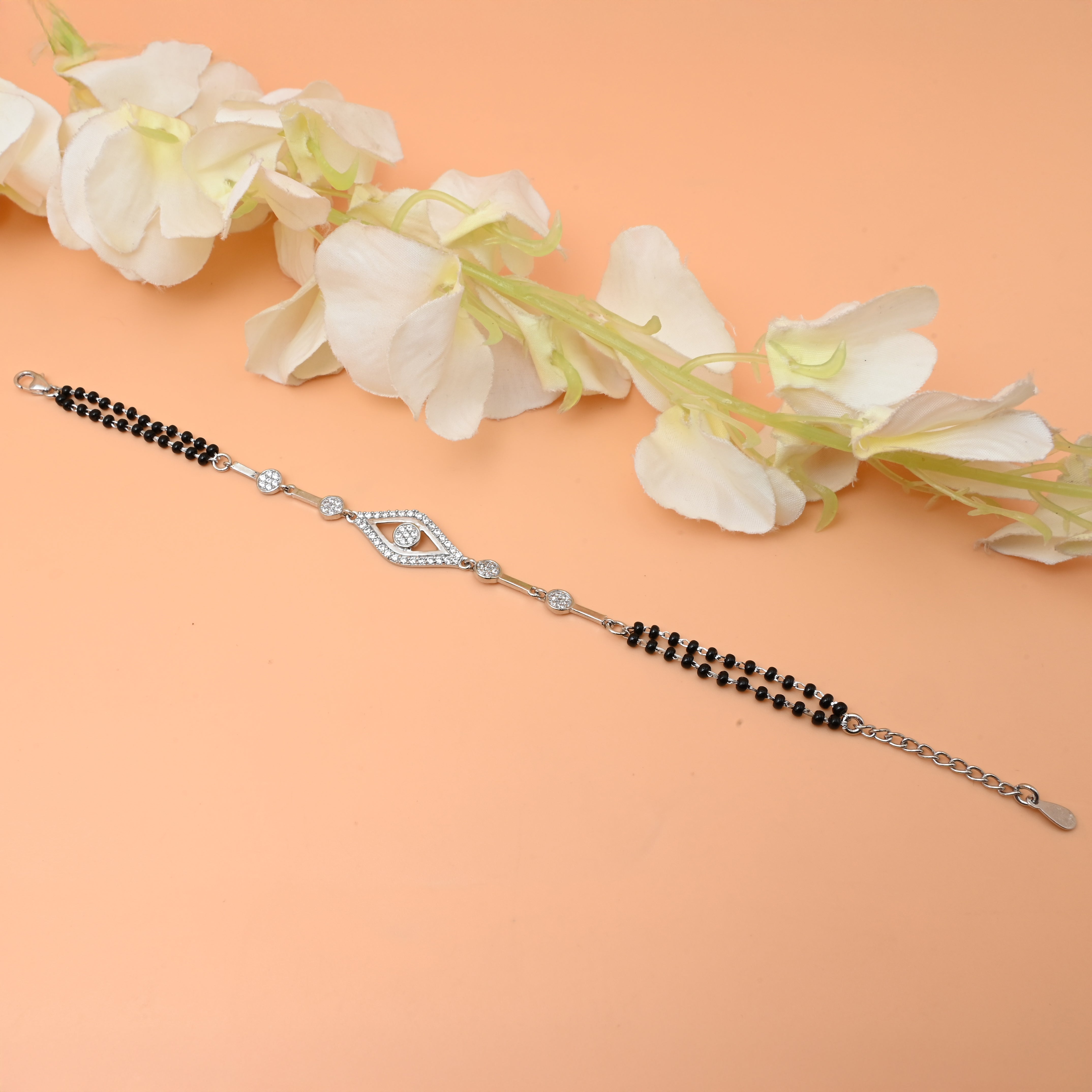 Silver Bracelet with White Eye-Shaped Buds – Unique Mangalsutra Pattern for Girls